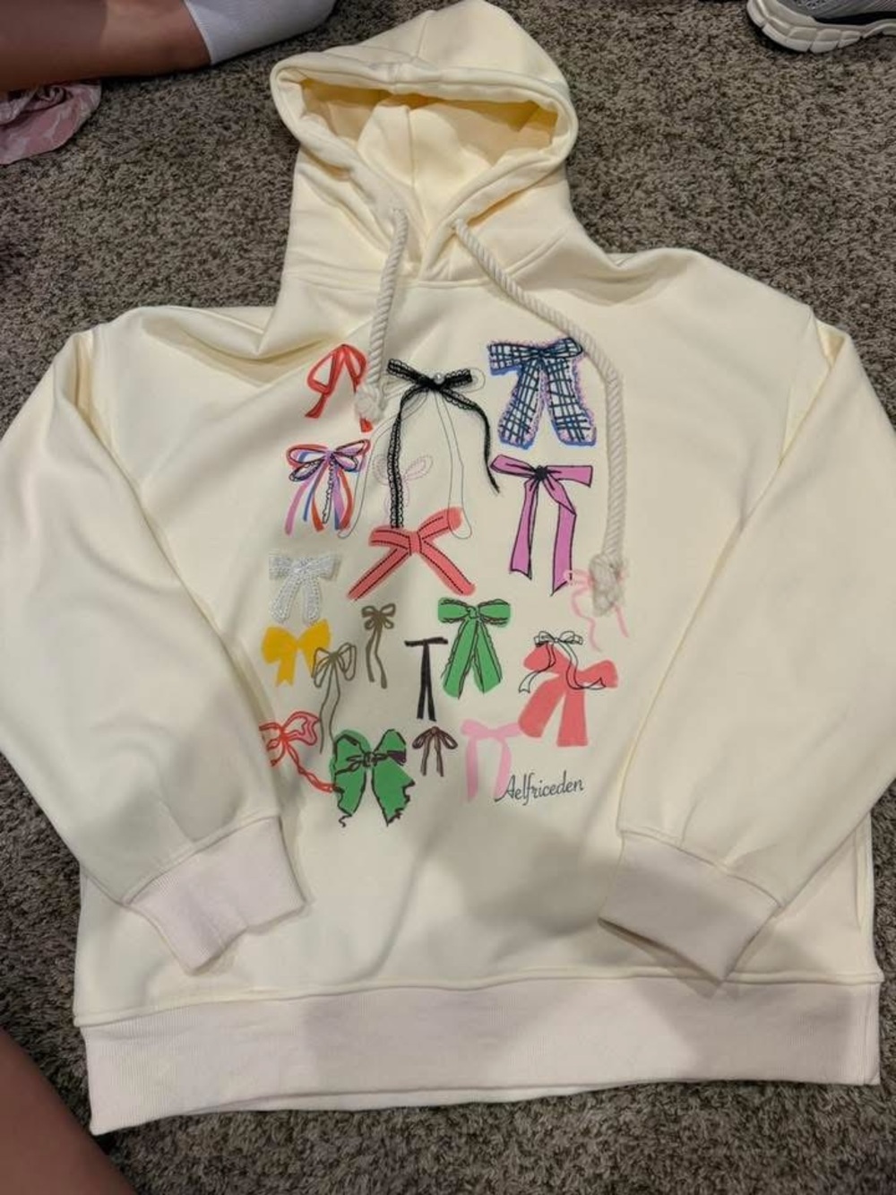 Aelfric Eden Cream Hoodie with Multicolor Bow Print